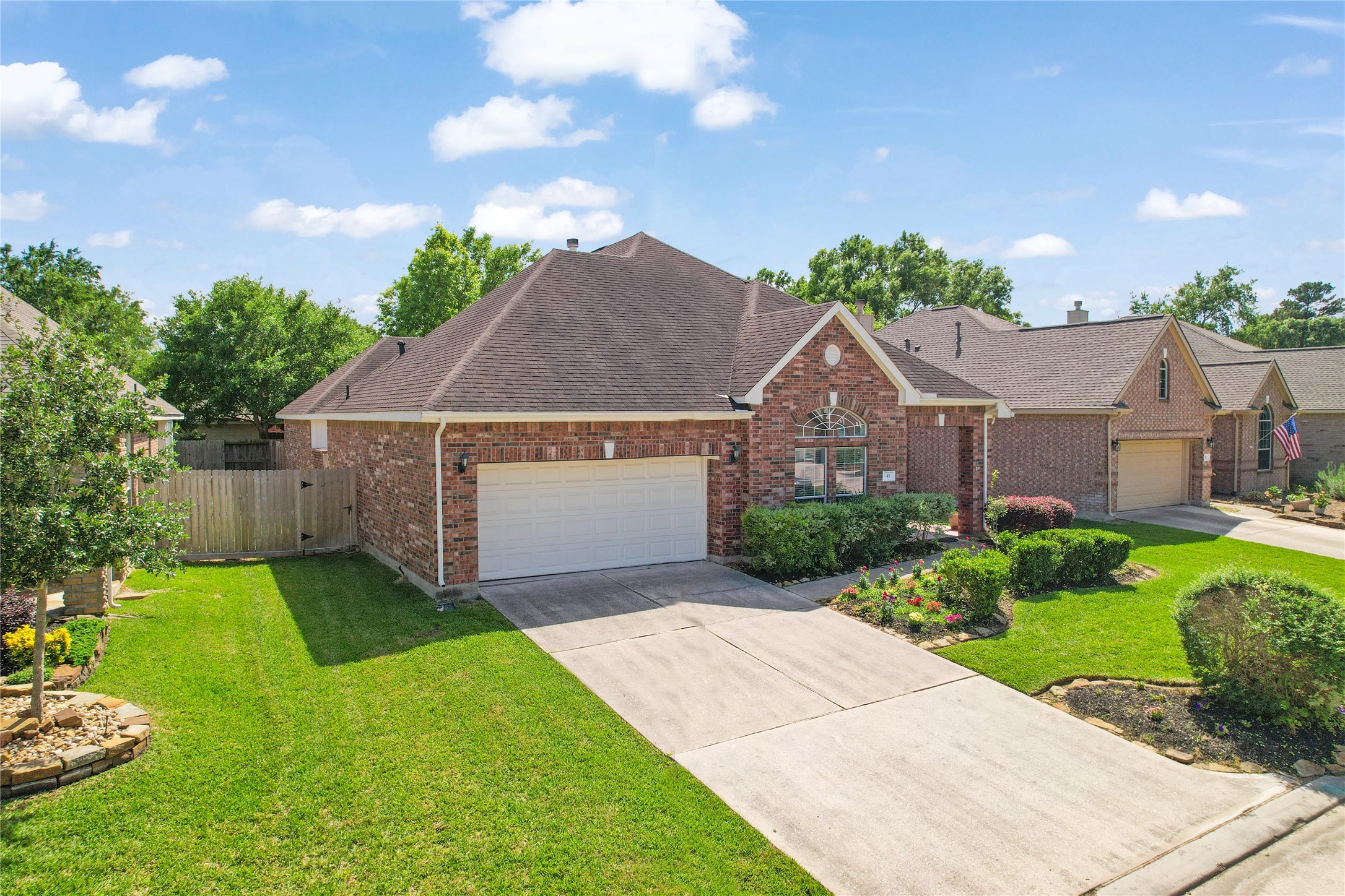 43 Tarrytown Way Conroe, TX 77384 - Photo 4 of 41 a aerial view of a house with yard and green space
