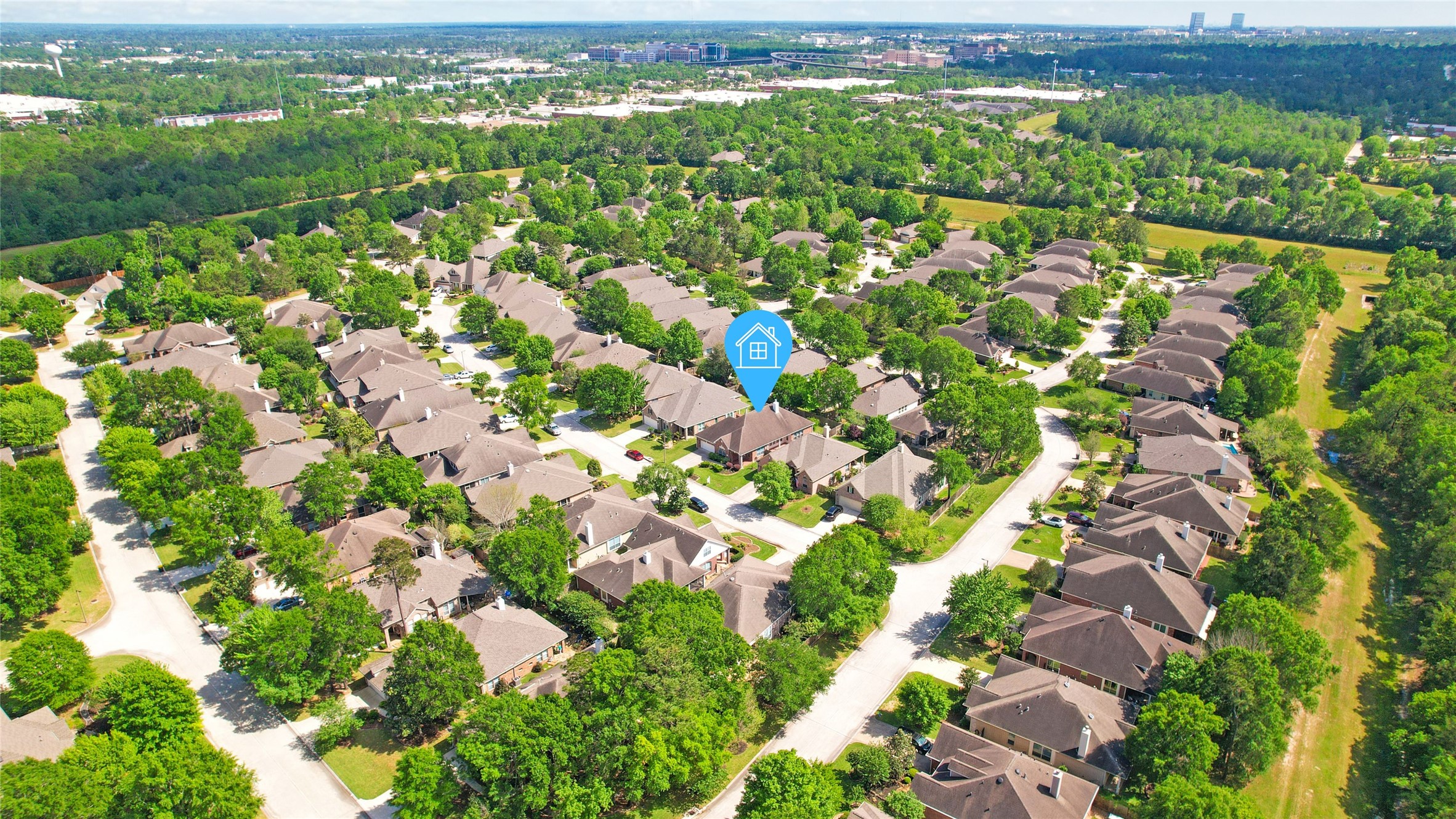 43 Tarrytown Way Conroe, TX 77384 - Photo 7 of 41 a view of a city