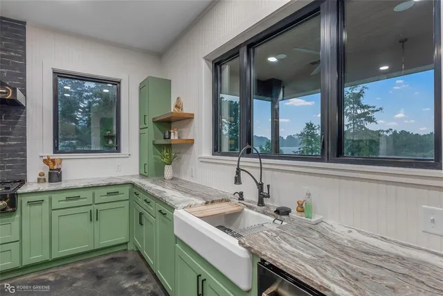 a kitchen with a stove and a wooden cabinets