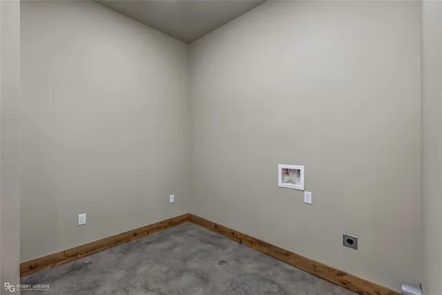 a view of a lake in middle of forest