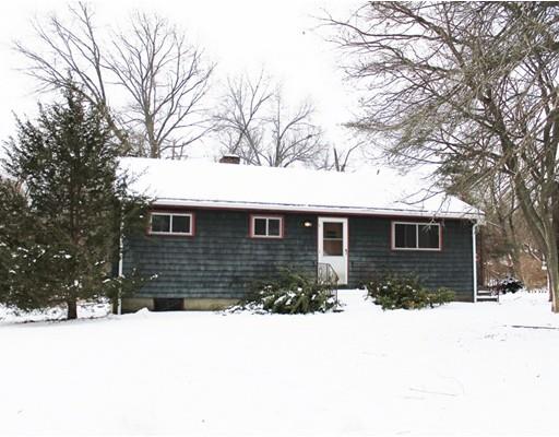 55 Bridge Street Lexington, MA 02421 - Photo 1 of 14 a front view of house with yard covered in snow