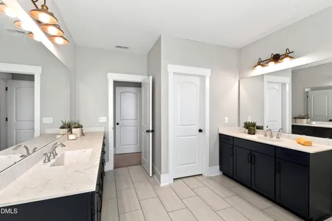 a room with furniture and a dresser