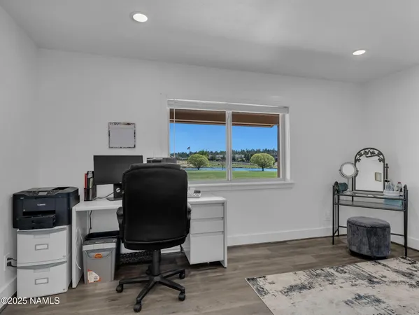 a view of livingroom with wooden floor and window