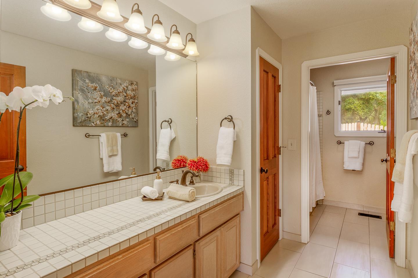 480 Hidden Valley Road Soquel, CA 95073 - Photo 23 of 72 a bathroom with a sink double vanity and a mirror