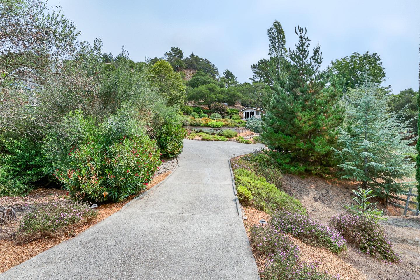 480 Hidden Valley Road Soquel, CA 95073 - Photo 43 of 72 a view of a pathway with a garden