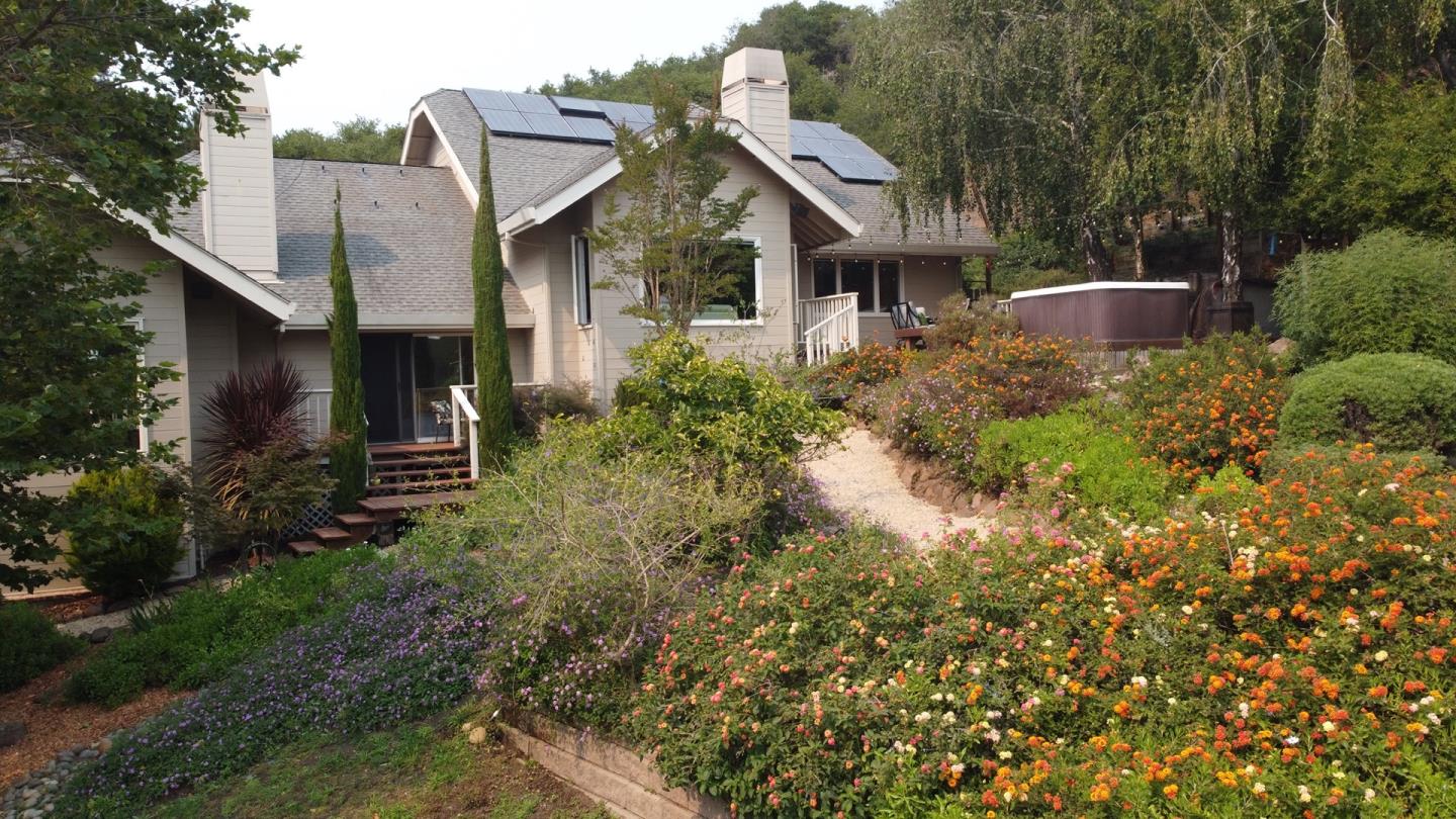 480 Hidden Valley Road Soquel, CA 95073 - Photo 49 of 72 a view of a house with a yard and plants