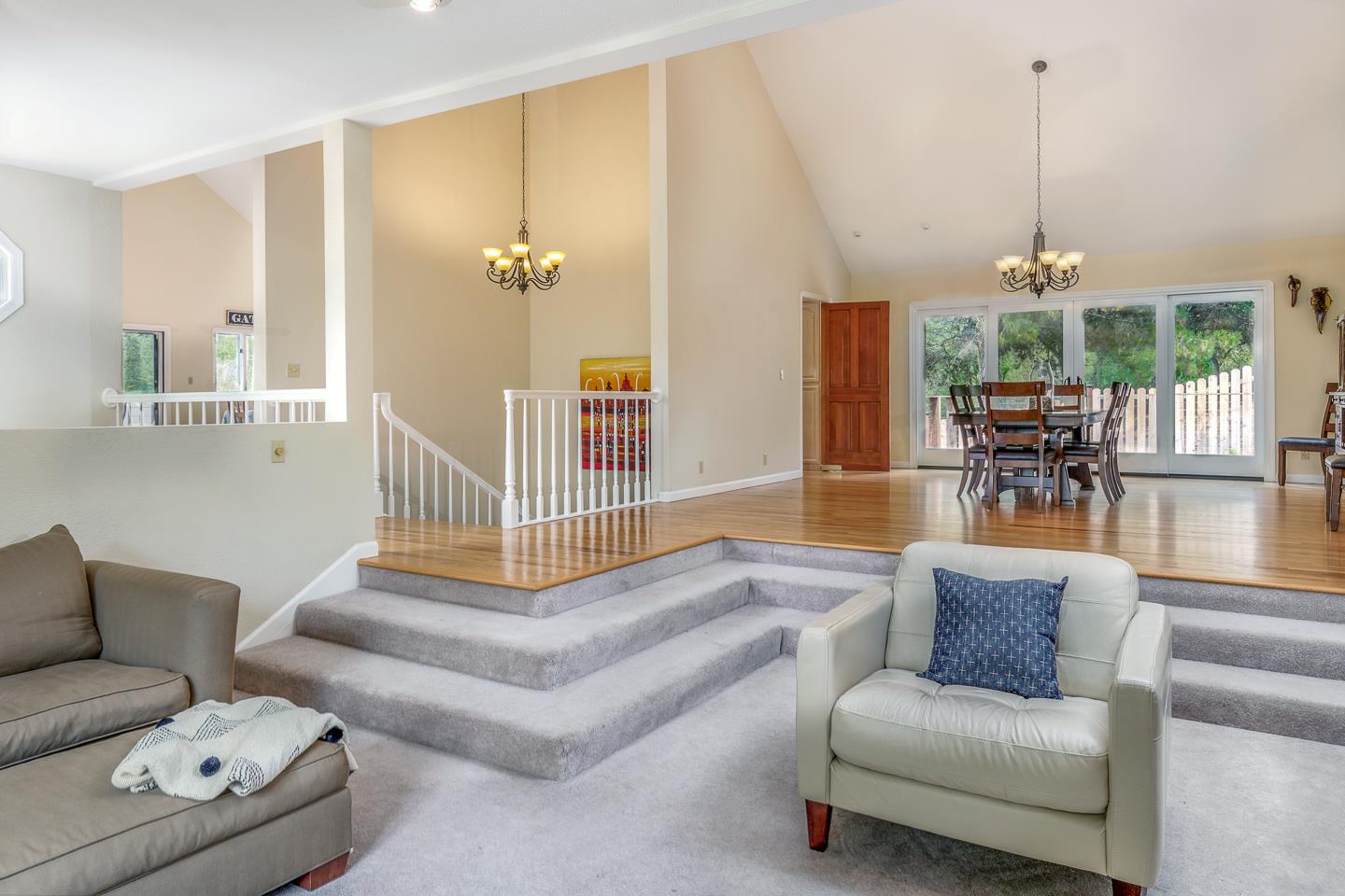 480 Hidden Valley Road Soquel, CA 95073 - Photo 6 of 72 a living room with furniture and a chandelier