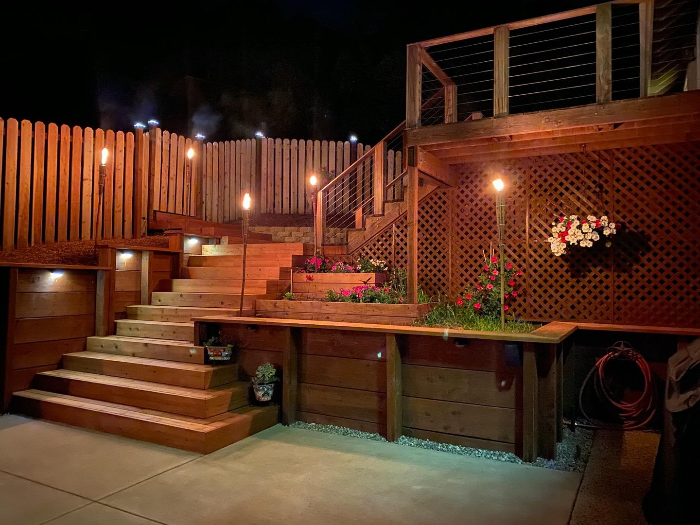 480 Hidden Valley Road Soquel, CA 95073 - Photo 64 of 72 a room with lots of wooden cabinets and a fireplace
