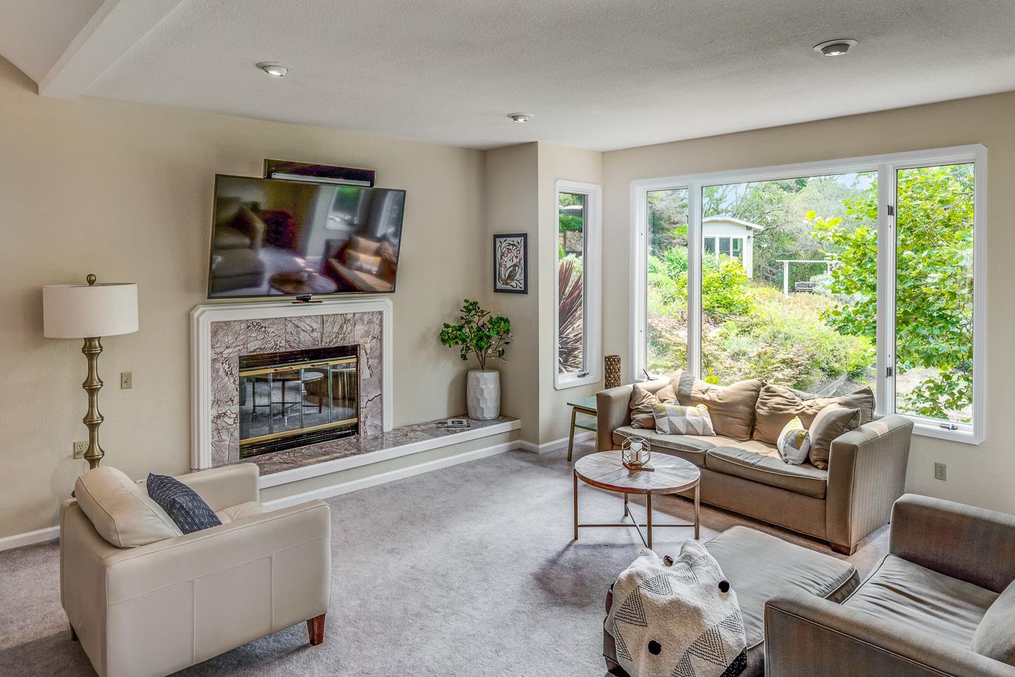 480 Hidden Valley Road Soquel, CA 95073 - Photo 7 of 72 a living room with furniture and a fireplace