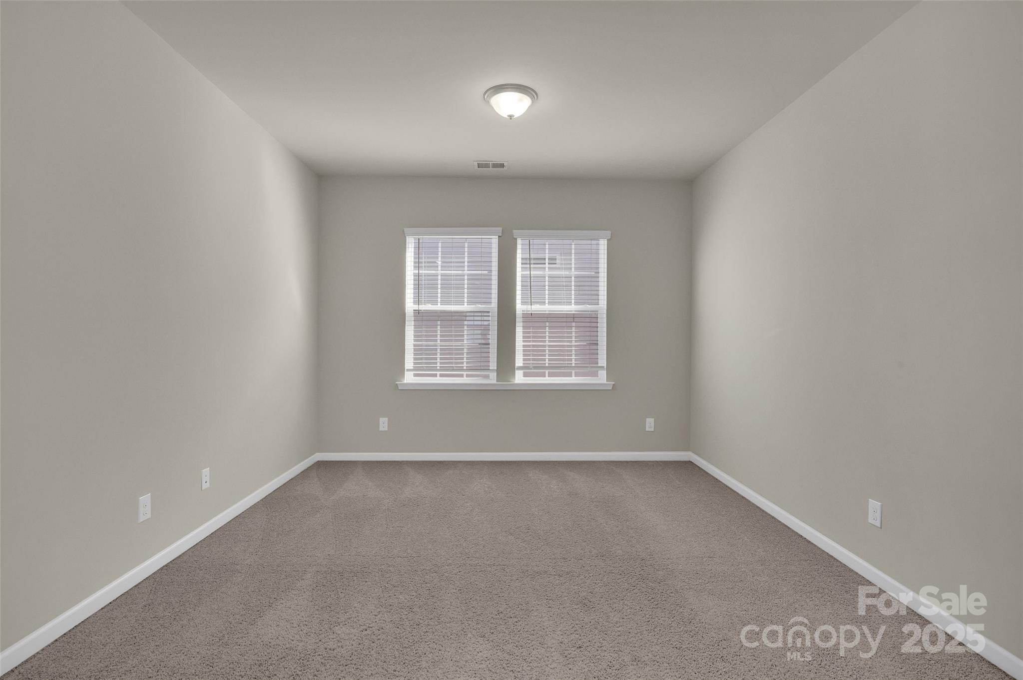 6130 Cloverdale Drive Tega Cay, SC 29708 - Photo 17 of 39 an empty room with windows
