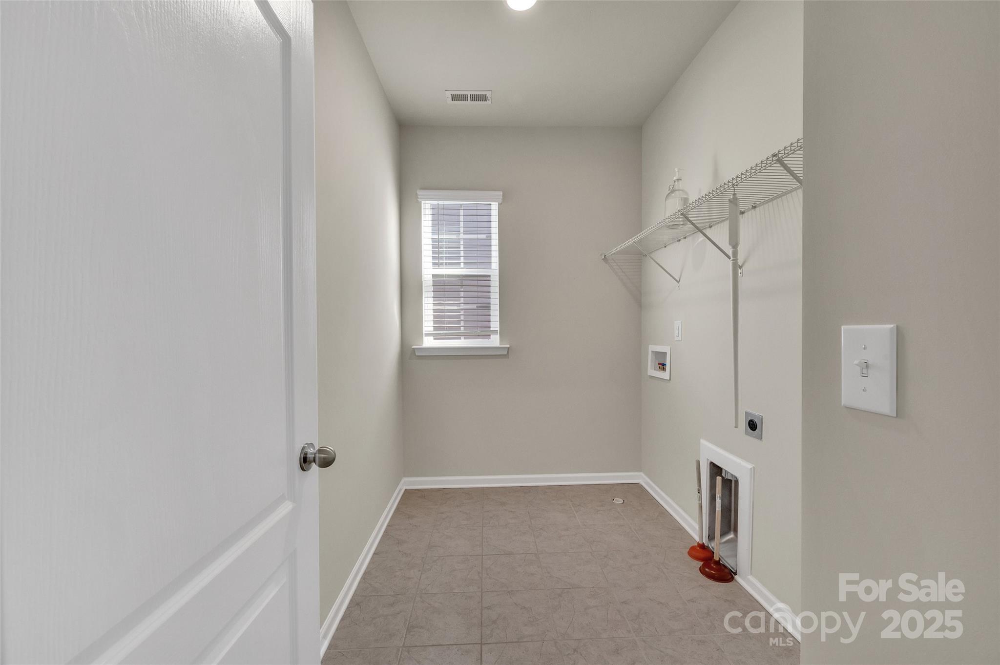 6130 Cloverdale Drive Tega Cay, SC 29708 - Photo 24 of 39 an empty room with windows