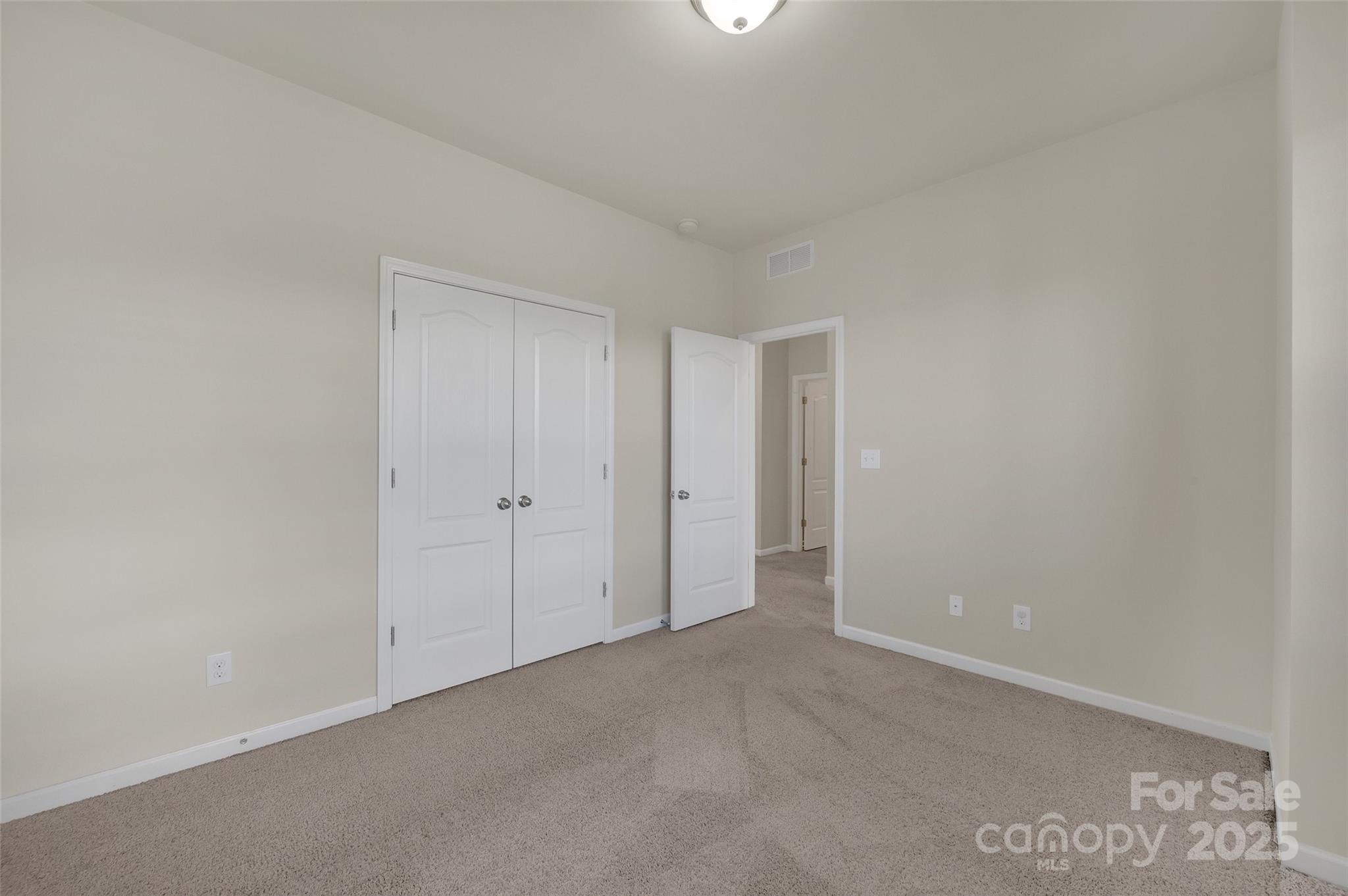 6130 Cloverdale Drive Tega Cay, SC 29708 - Photo 26 of 39 a view of an empty room