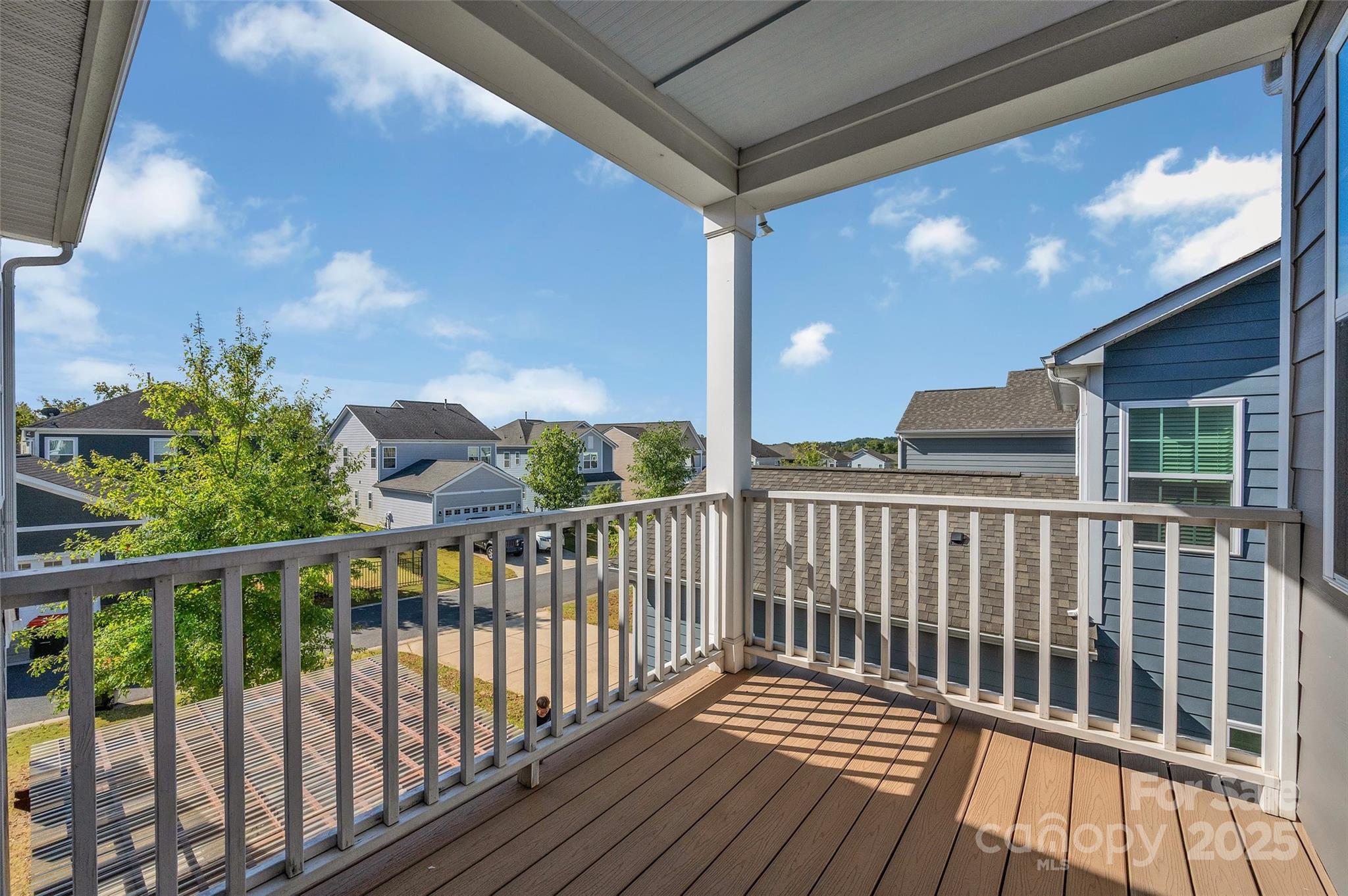 6130 Cloverdale Drive Tega Cay, SC 29708 - Photo 32 of 39 a view of balcony with wooden floor