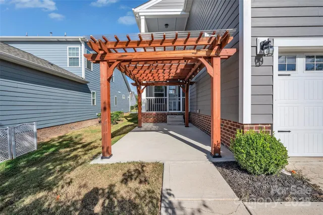 a view of a house with basketball court