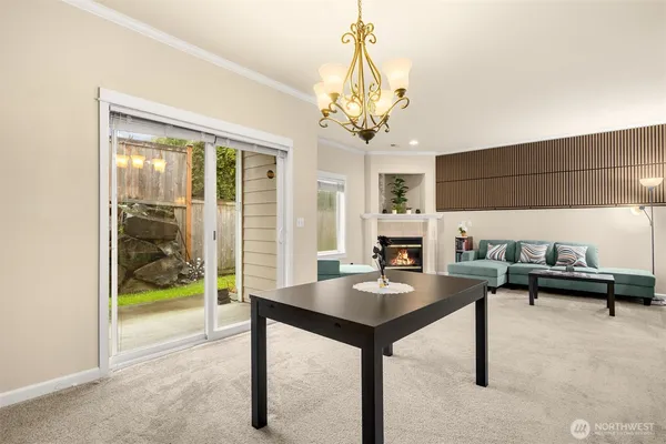 a view of a livingroom with furniture and window