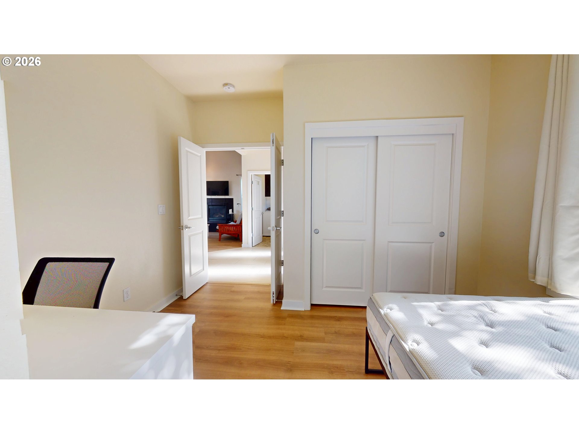 375 Mia Lane Eugene, OR 97401 - Photo 22 of 44 a living room with a bed and a mirror