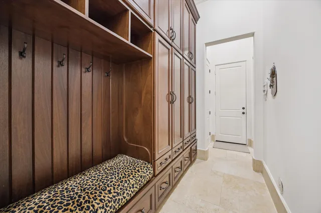 a bed room with a bed window and a flat screen tv