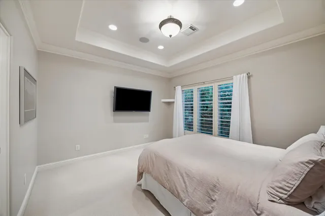 a bathroom with a granite countertop sink a toilet and a bathtub