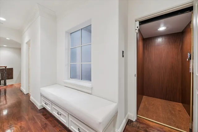 a bathroom with a sink mirror and vanity