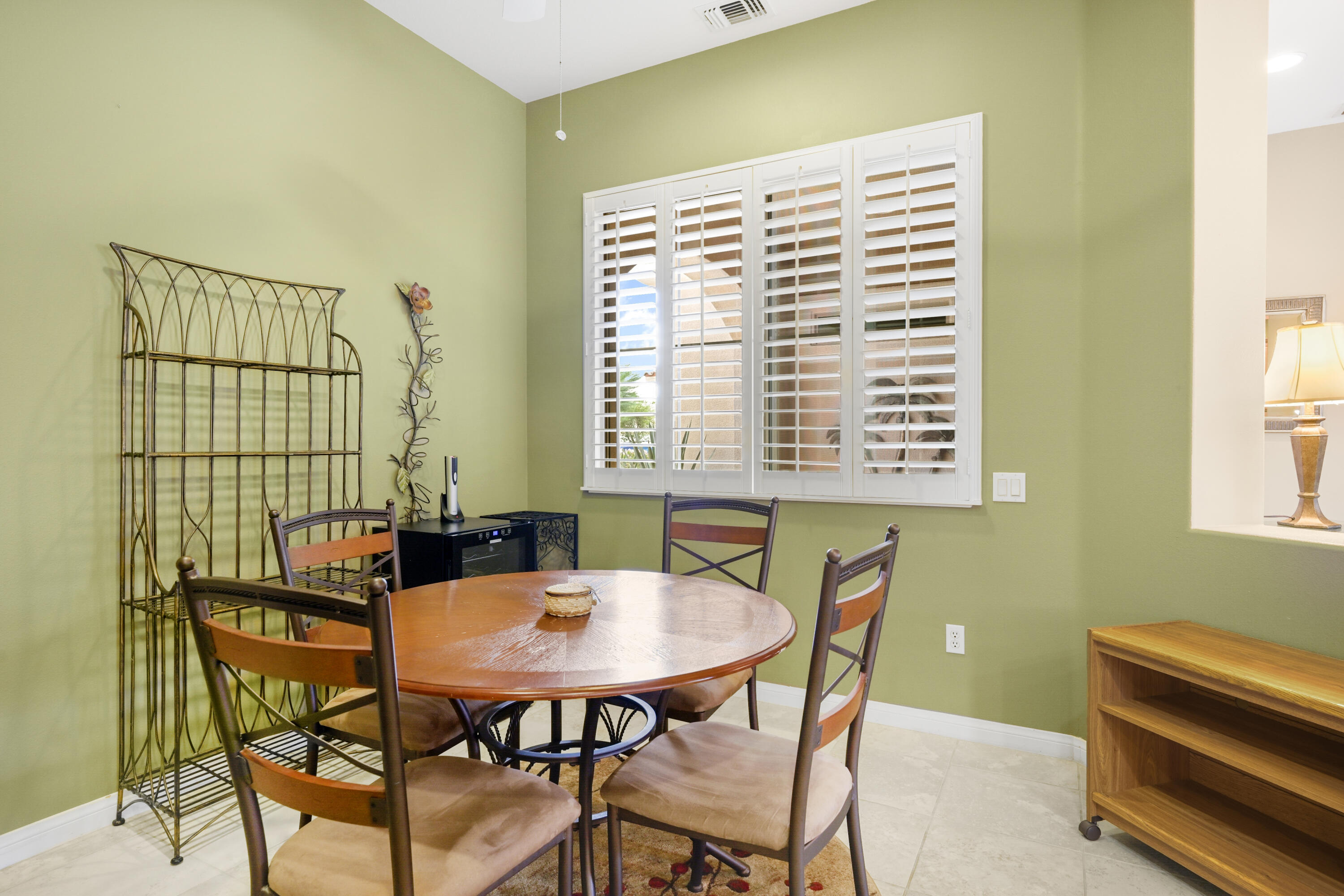 40267 Calle Ebano Indio, CA 92203 - Photo 11 of 48 a view of a dining room with furniture and a window