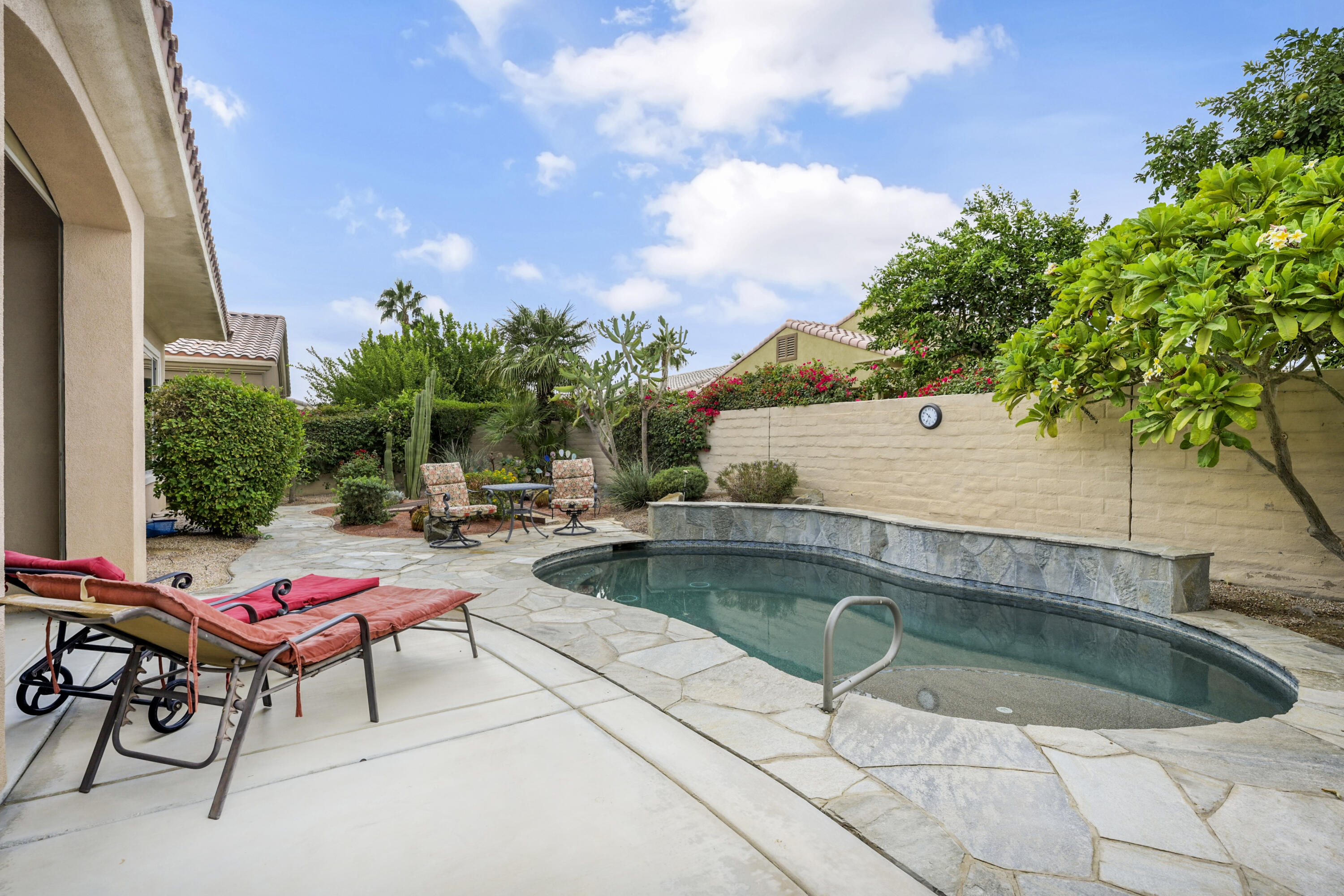 40267 Calle Ebano Indio, CA 92203 - Photo 23 of 48 a view of a swimming pool with lounge chair