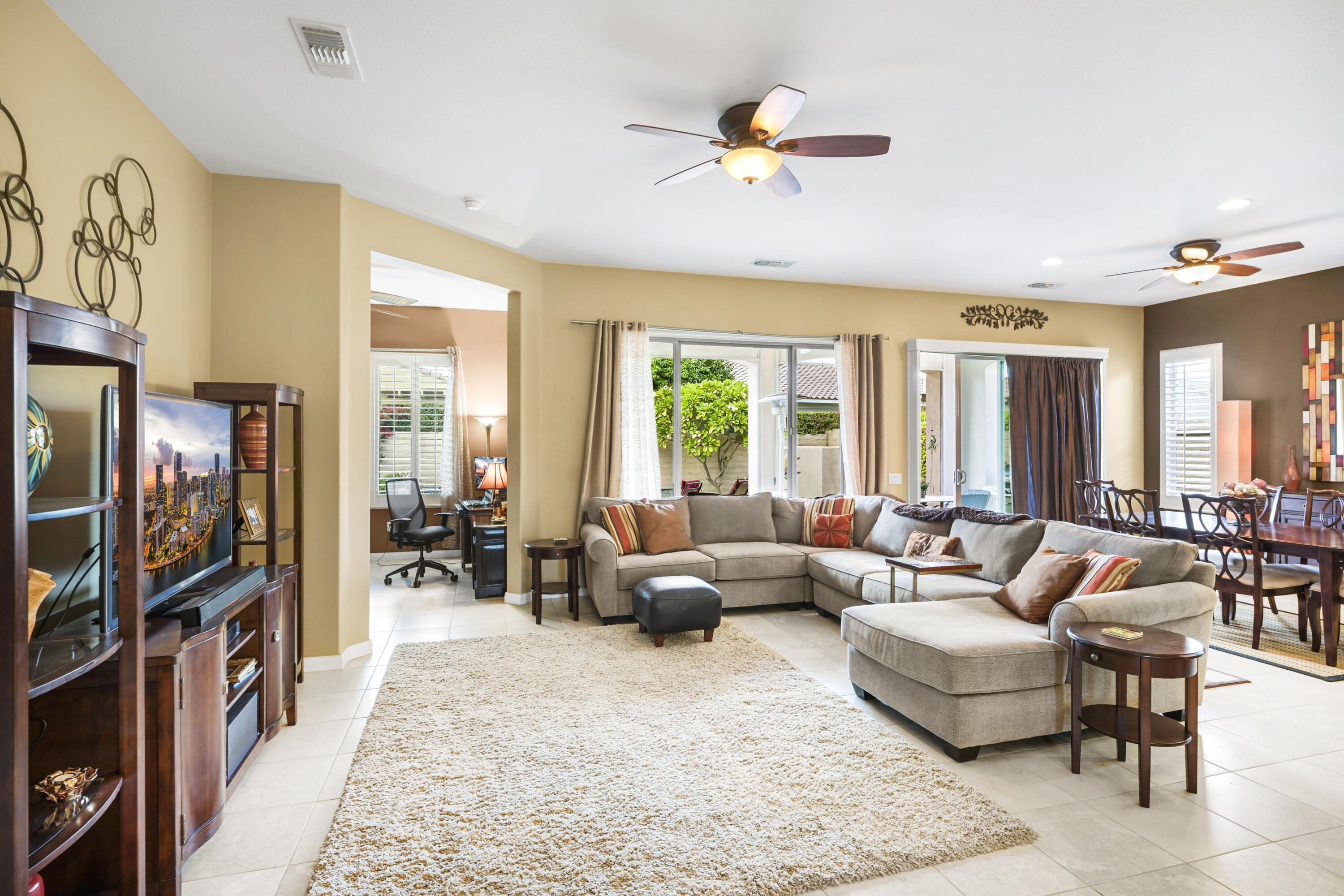 40267 Calle Ebano Indio, CA 92203 - Photo 3 of 48 a living room with furniture and a flat screen tv