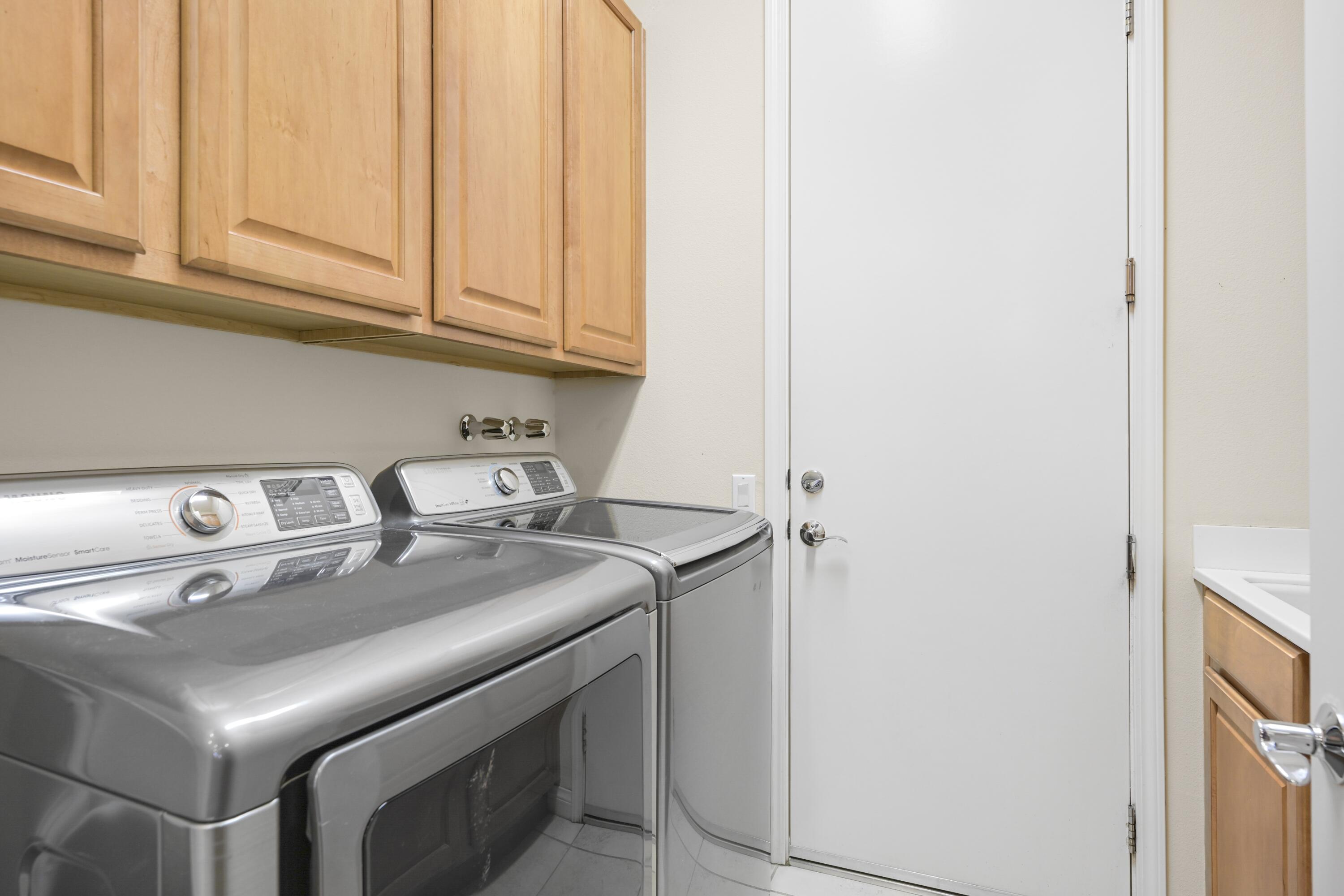 40267 Calle Ebano Indio, CA 92203 - Photo 34 of 48 a utility room with dryer and washer