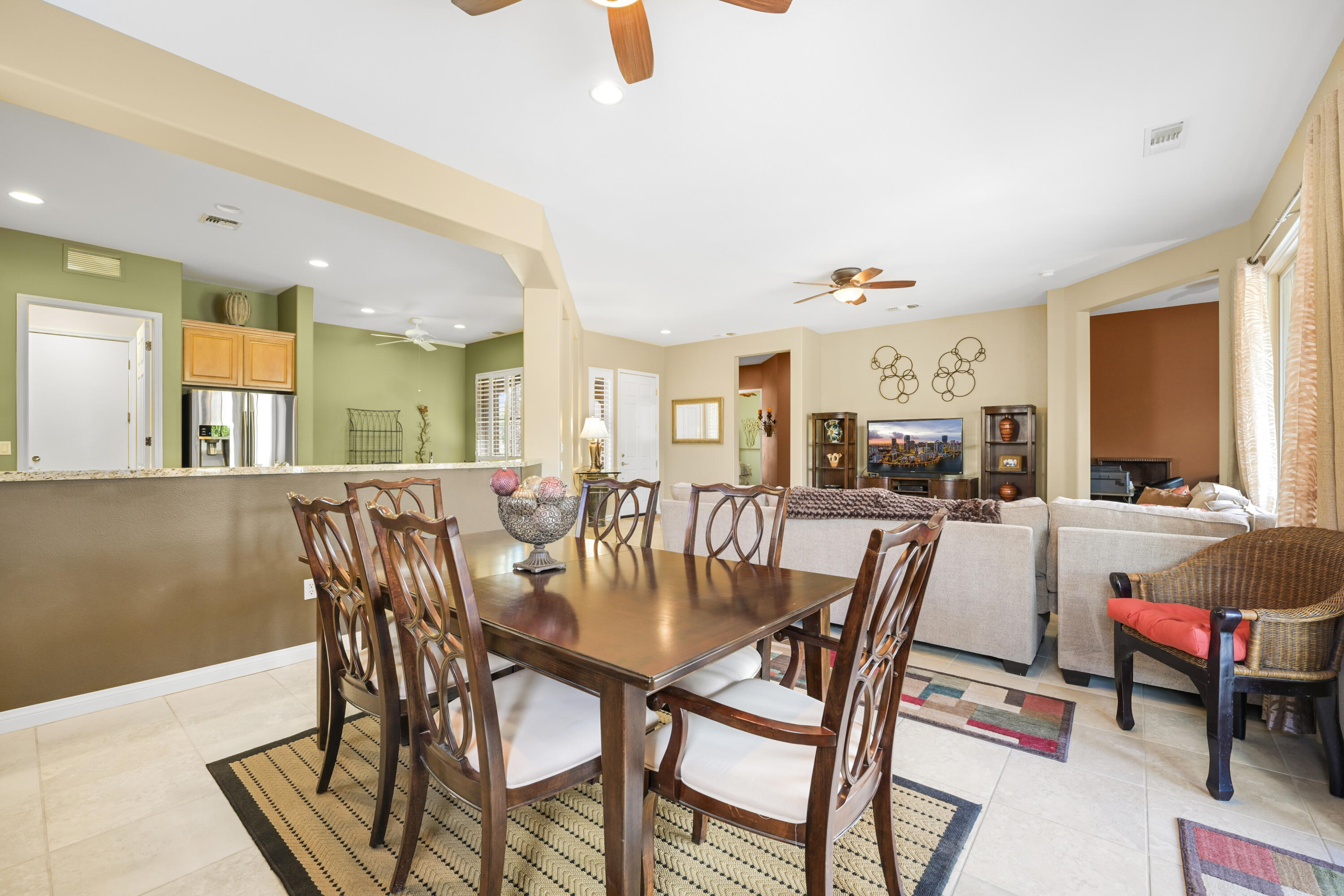40267 Calle Ebano Indio, CA 92203 - Photo 7 of 48 a view of a dining room with furniture and a chandelier