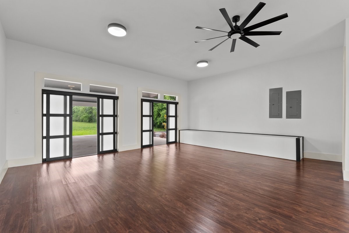 3237 Harkey Road Pearland, TX 77584 - Photo 37 of 46 Additional view of versatile separate space featuring two sliding doors