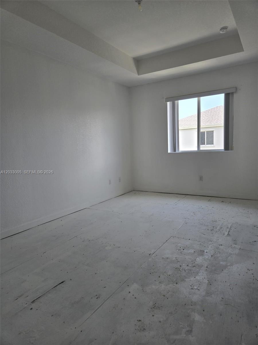 862 Southeast 17 Street, Unit 862 Homestead, FL 33034 - Photo 33 of 39 a view of an empty room with a window