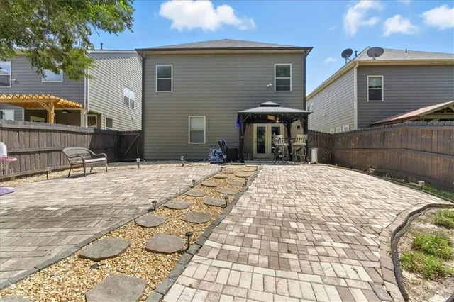 a house view with a outdoor space