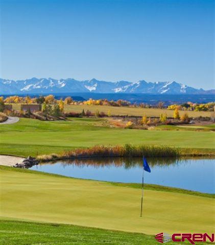 Lot 1231 Wildhorse Circle Montrose, CO 81401 - Photo 7 of 10 a view of an ocean and a mountain