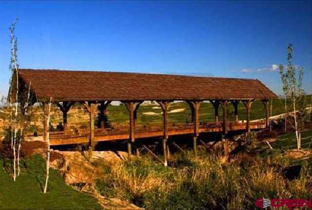 Lot 1231 Wildhorse Circle Montrose, CO 81401 - Photo 9 of 10 a view of a chairs and table in the patio