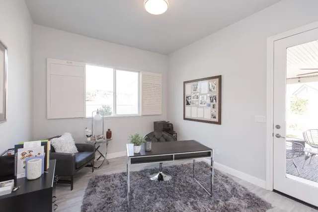 a living room with furniture and a window
