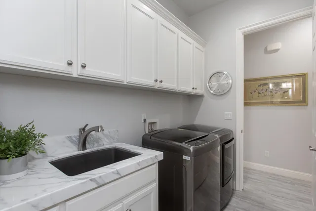 a view of kitchen and utility room