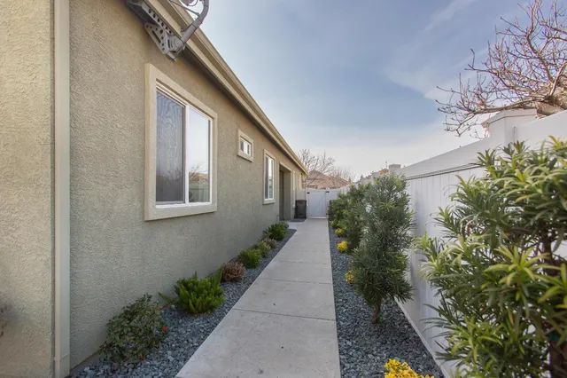 a house with trees in front of it