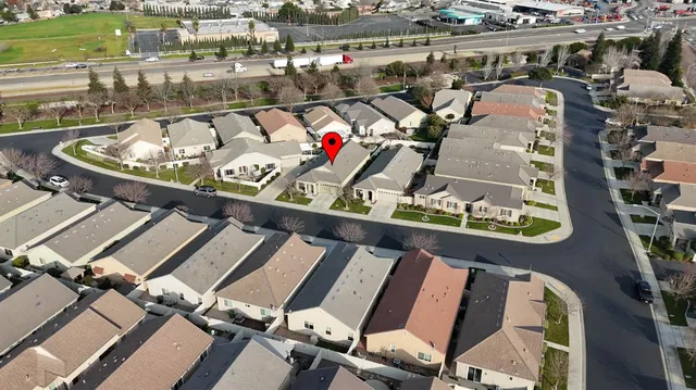 an aerial view of a chairs and table on the terrace