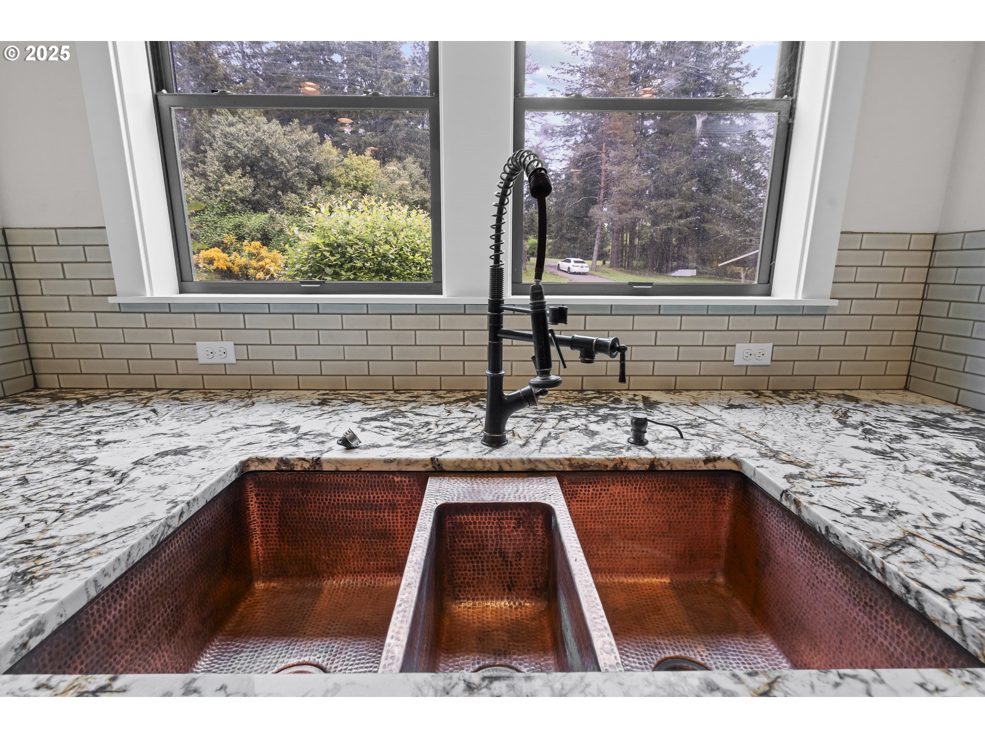 39665 Southeast Rude Road Sandy, OR 97055 - Photo 14 of 48 a kitchen with granite countertop a stove and a sink