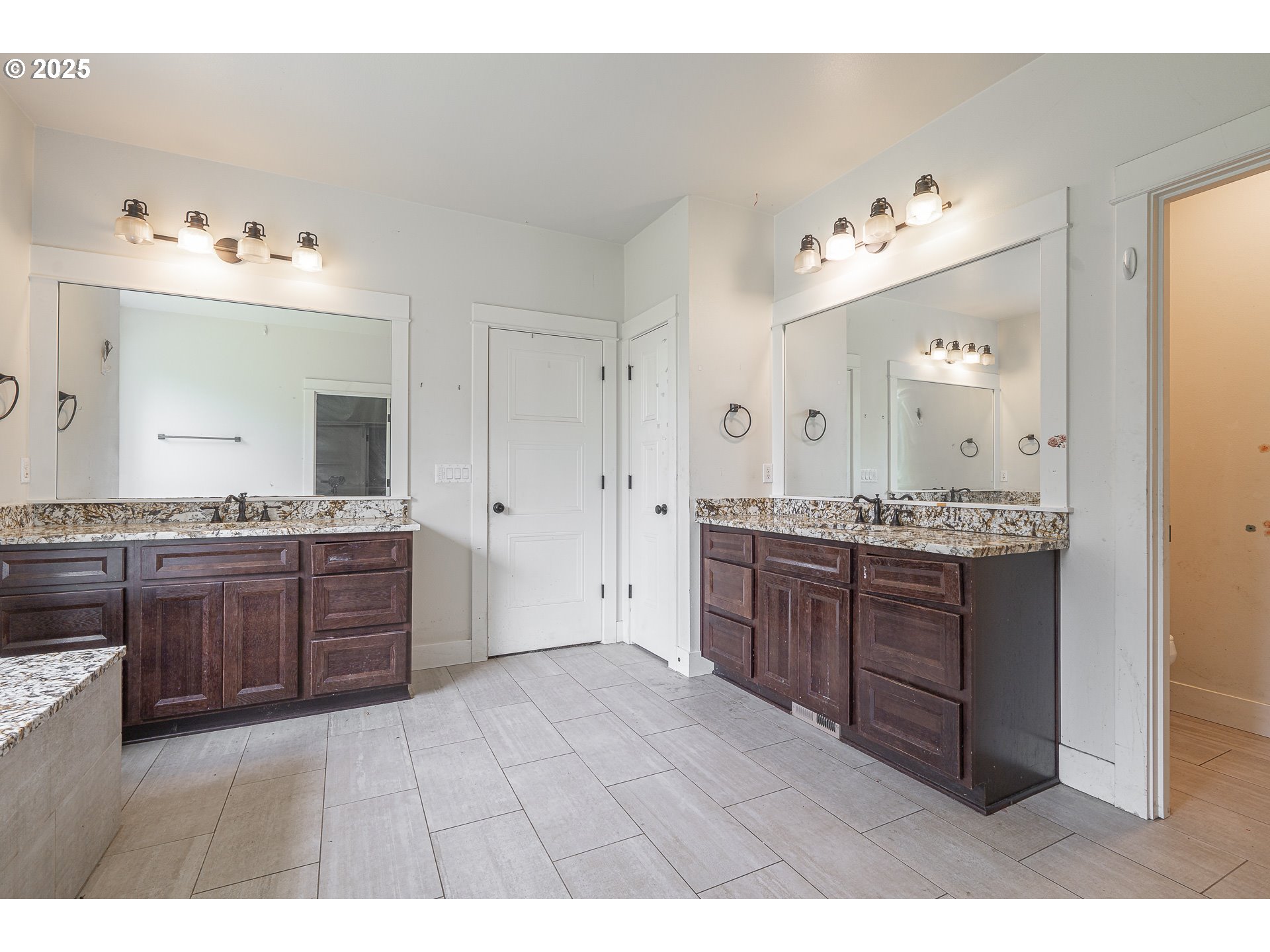 39665 Southeast Rude Road Sandy, OR 97055 - Photo 21 of 48 a spacious bathroom with a granite countertop sink mirror and cabinets