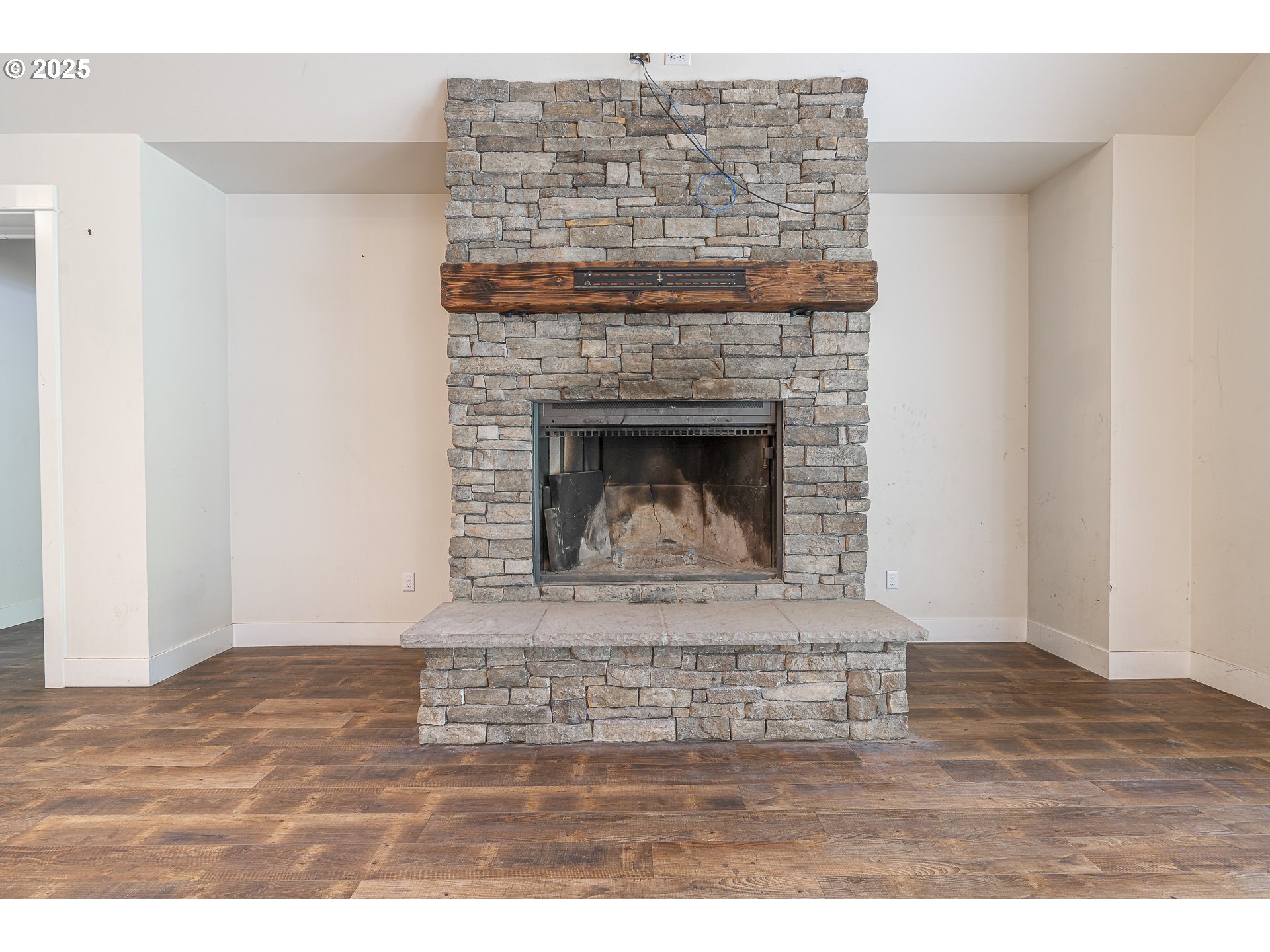39665 Southeast Rude Road Sandy, OR 97055 - Photo 7 of 48 a living room with a fireplace