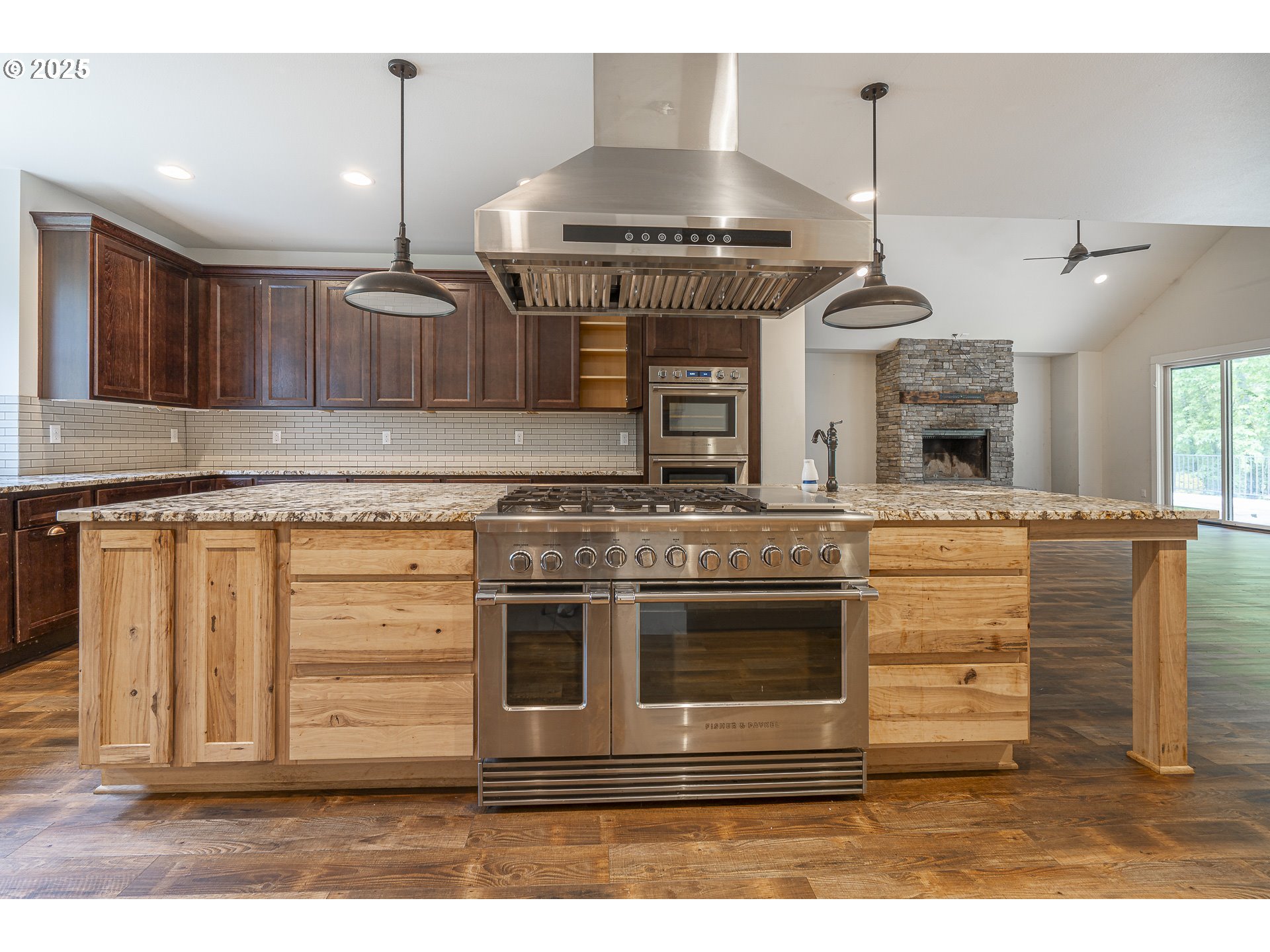39665 Southeast Rude Road Sandy, OR 97055 - Photo 10 of 48 a kitchen with stainless steel appliances granite countertop a stove and a cabinets