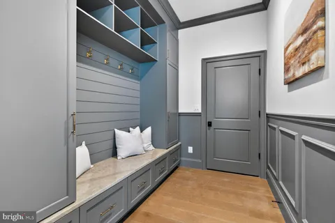 a spacious bathroom with a bathtub sink and mirror