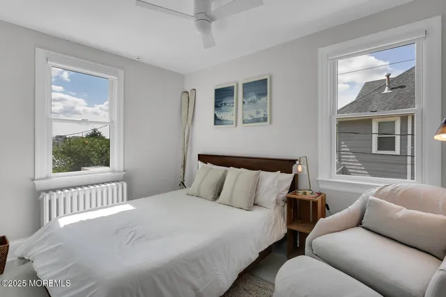 a view of a bedroom with furniture window and outside view