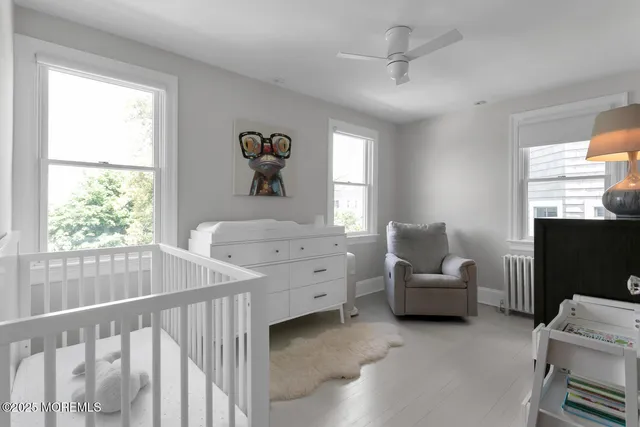 a view of a bedroom with furniture window and outside view
