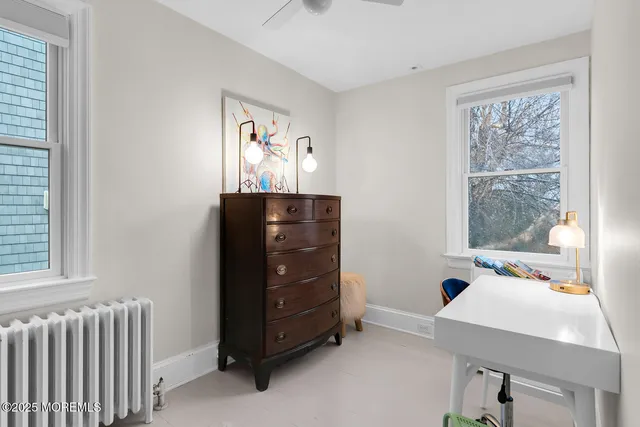 a bathroom with a shower and a toilet
