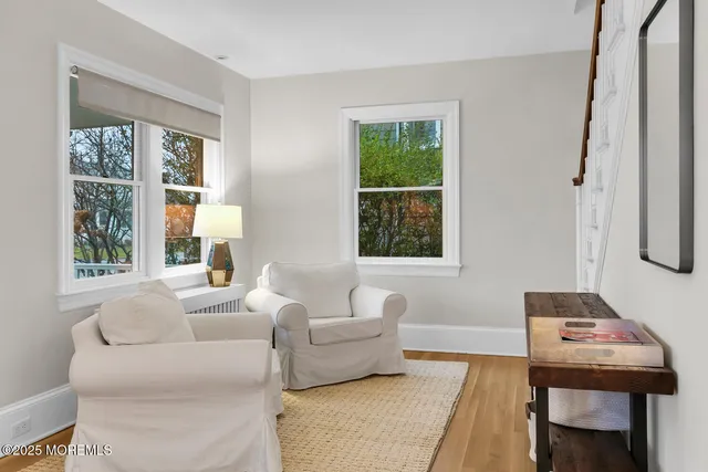 a view of livingroom with furniture and window