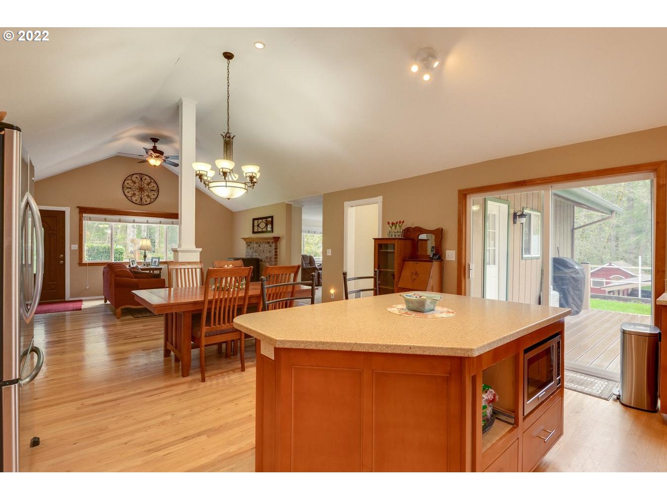 23767 Southeast McCabe Road Sandy, OR 97055 - Photo 11 of 32 a view of a dining room with furniture window and wooden floor
