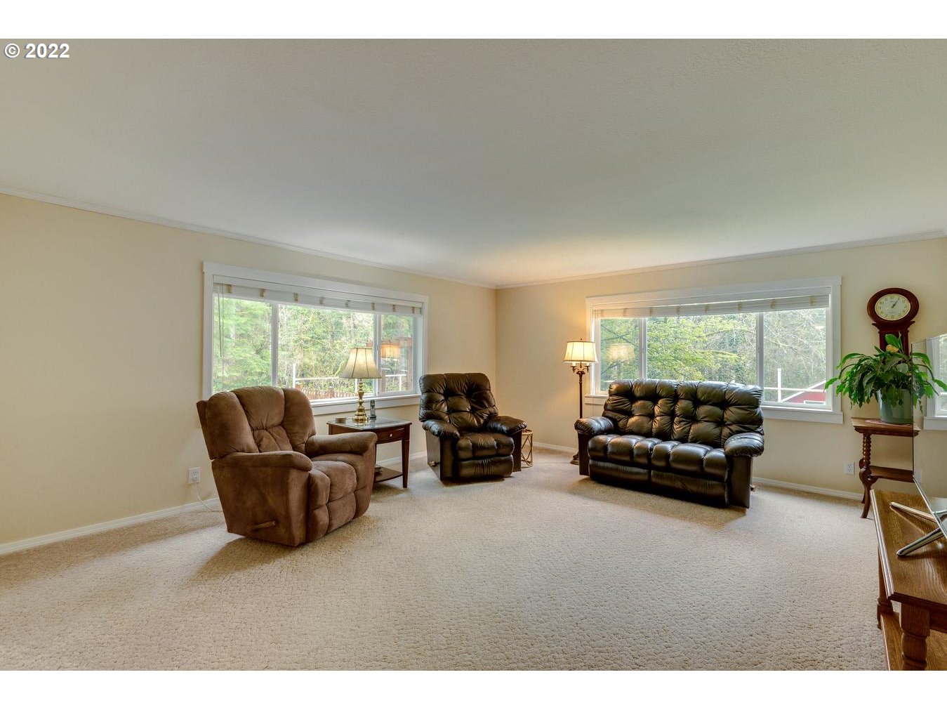 23767 Southeast McCabe Road Sandy, OR 97055 - Photo 17 of 32 a living room with furniture and a large window