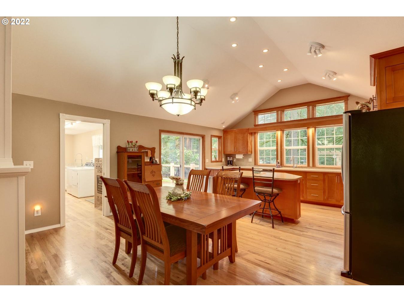 23767 Southeast McCabe Road Sandy, OR 97055 - Photo 7 of 32 a view of a dining room with furniture window and outside view