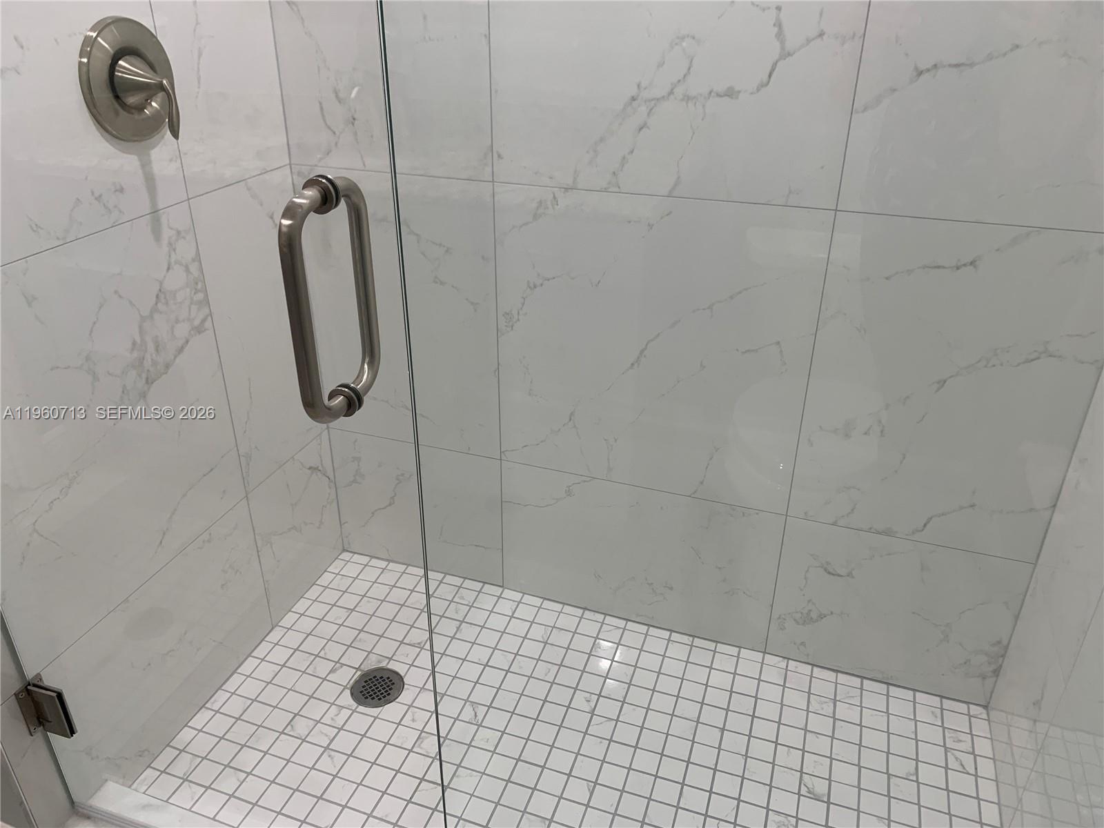 6102 Southeast Landing Way, Unit 14 Stuart, FL 34997 - Photo 23 of 45 Guest Shower